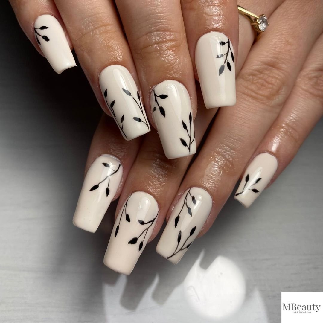 1 - Picture of Black and White Nails