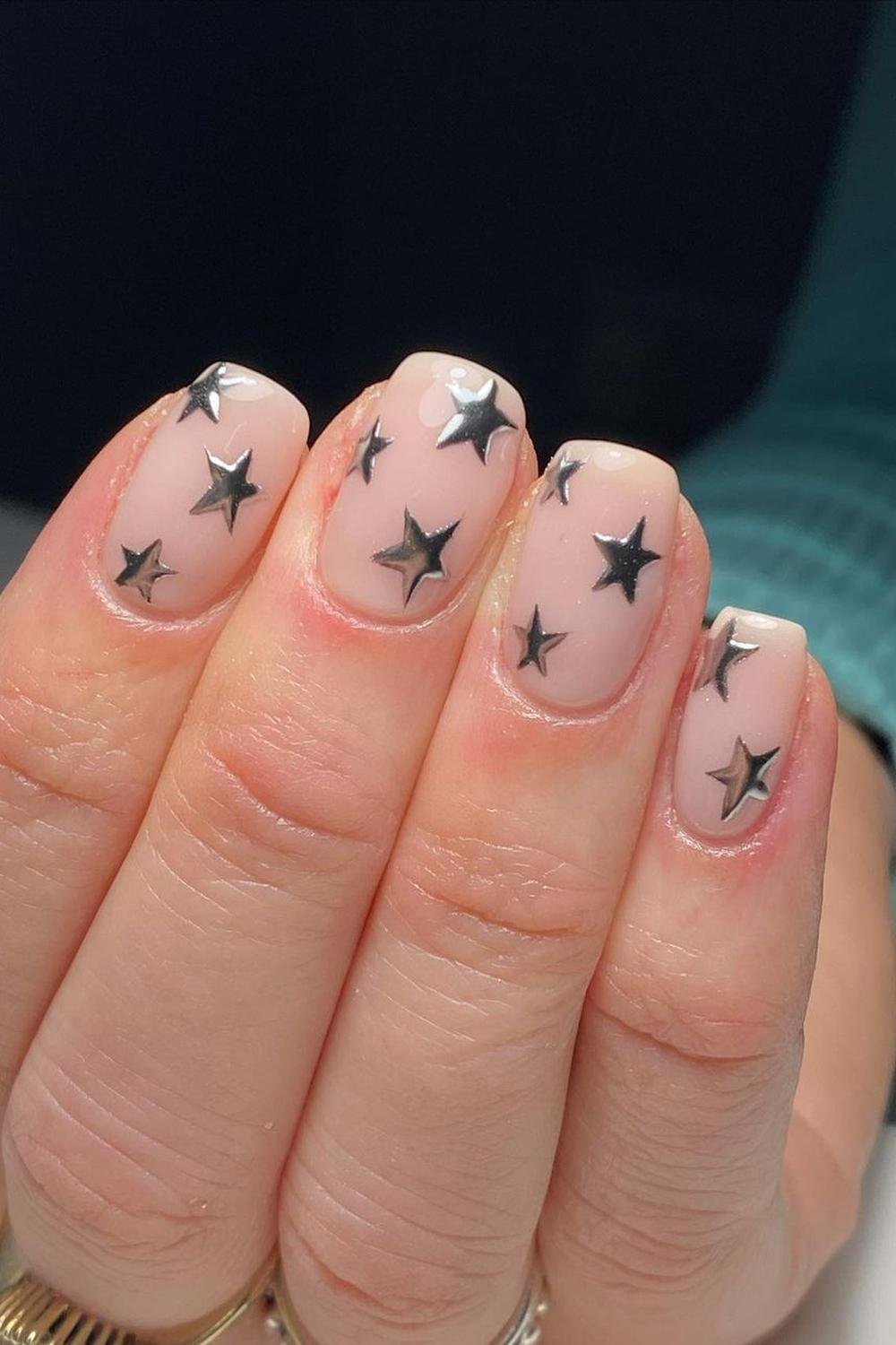 10 - Picture of Chrome Star Nails