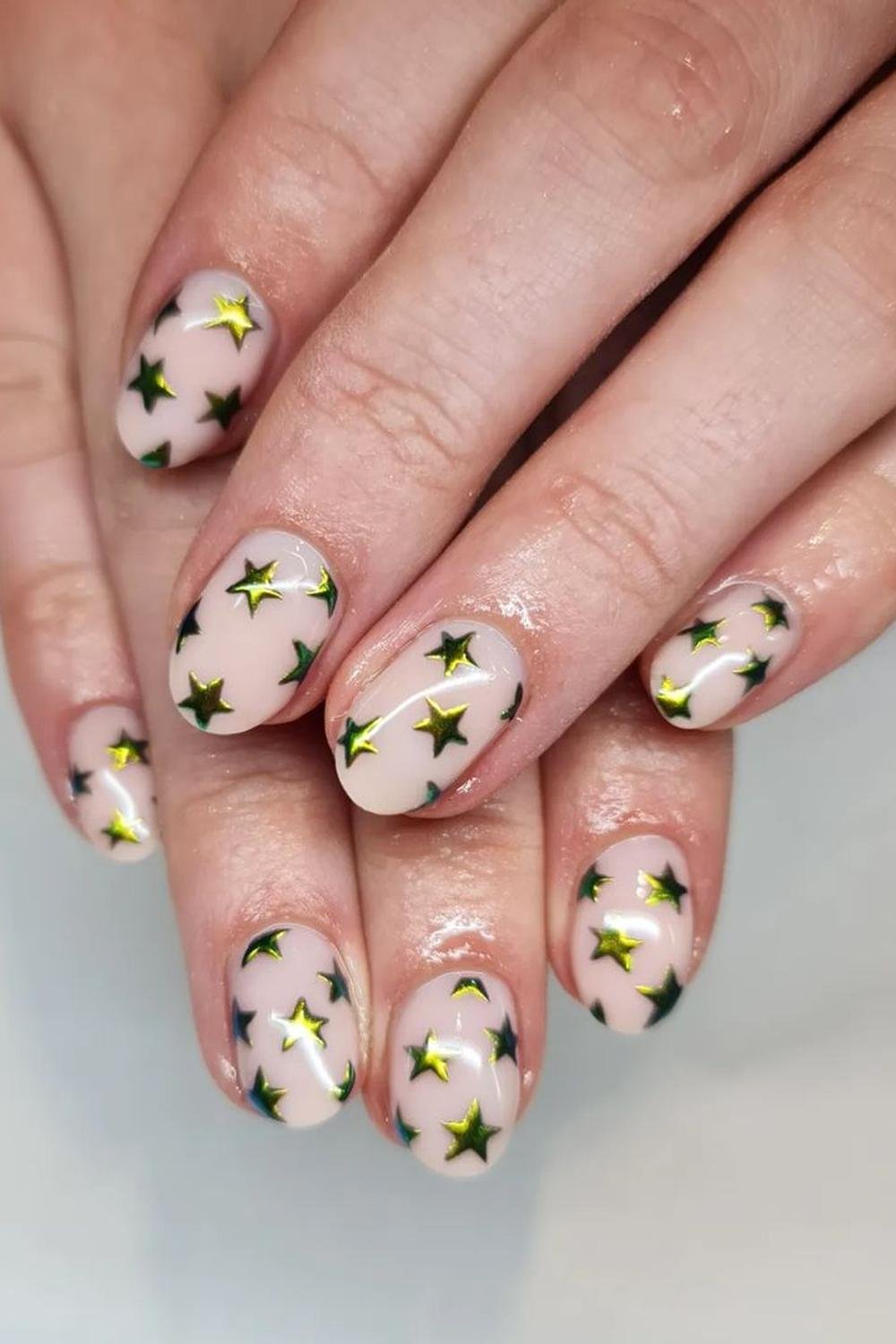 11 - Picture of Chrome Star Nails