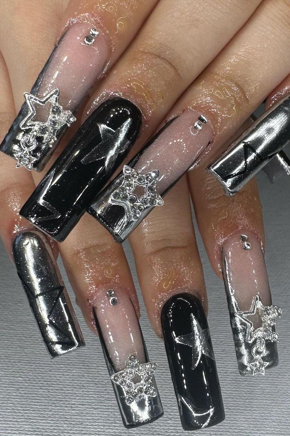 12 - Picture of Chrome Star Nails