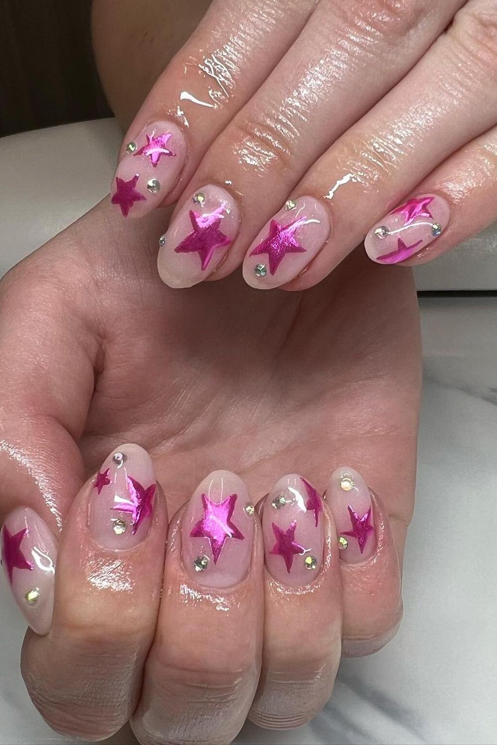 13 - Picture of Chrome Star Nails