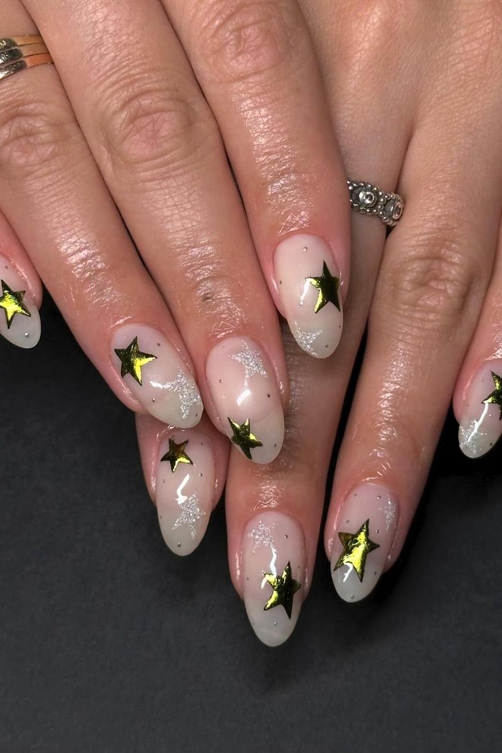 14 - Picture of Chrome Star Nails