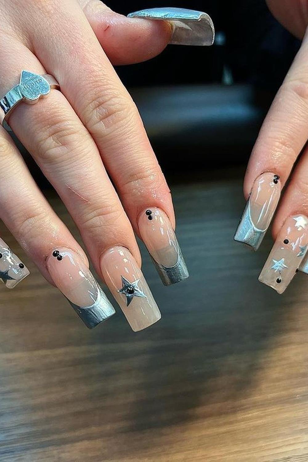 15 - Picture of Chrome Star Nails