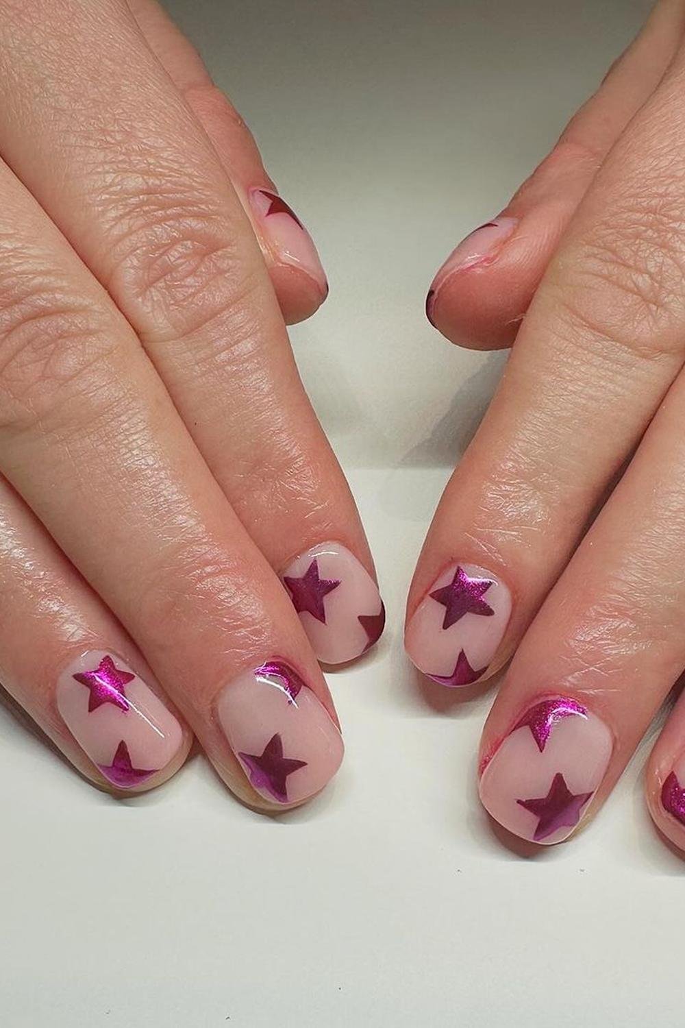 17 - Picture of Chrome Star Nails
