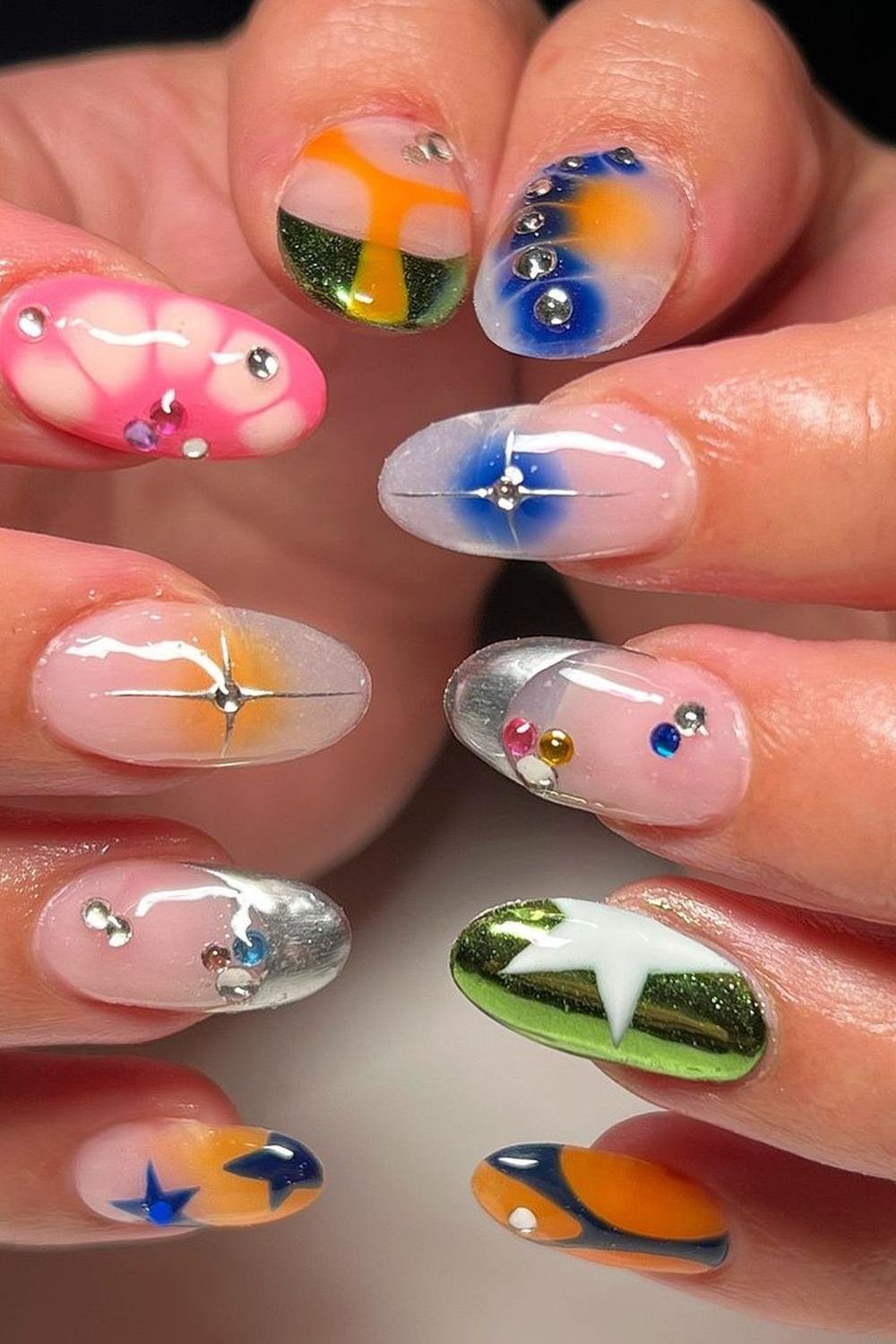 21 - Picture of Chrome Star Nails