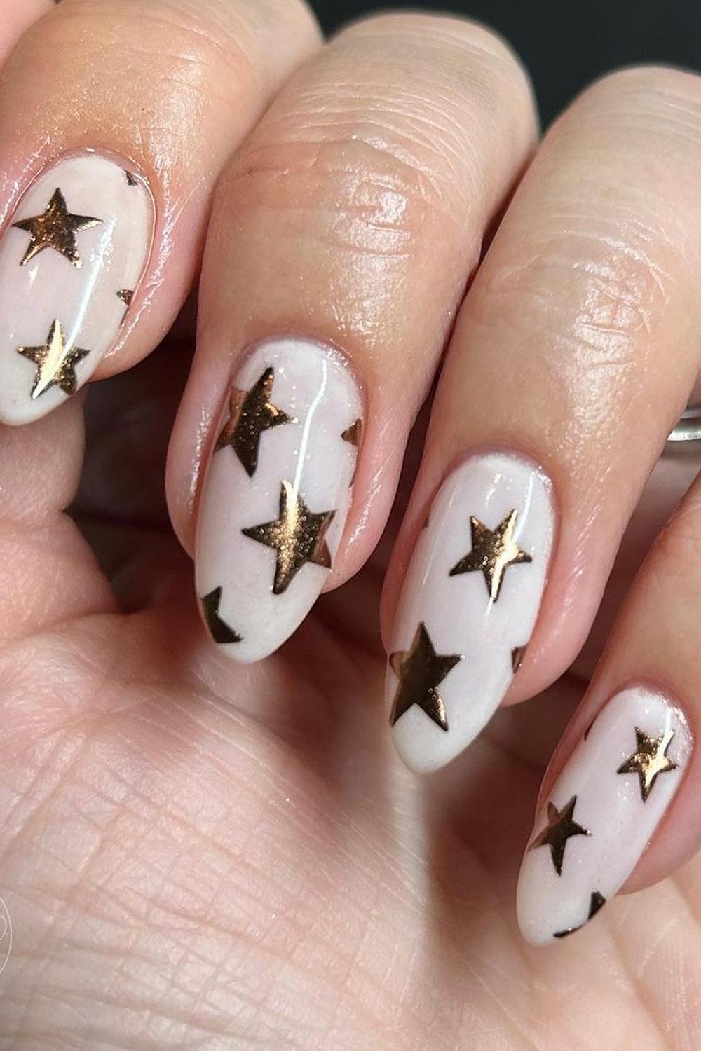 23 - Picture of Chrome Star Nails