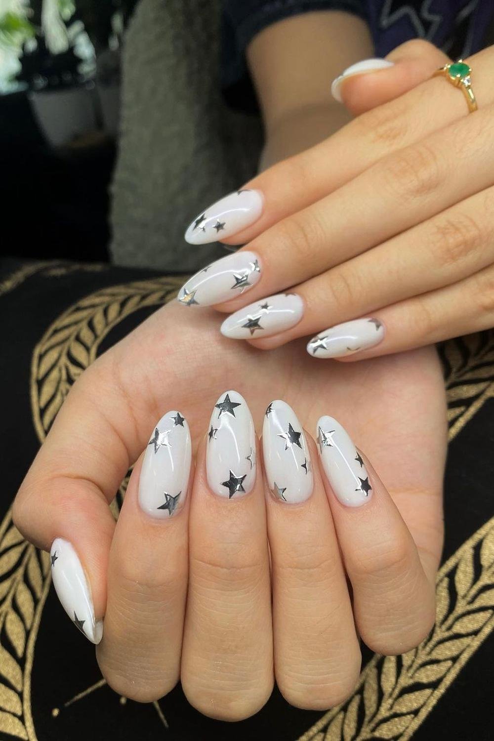 37 - Picture of Chrome Star Nails