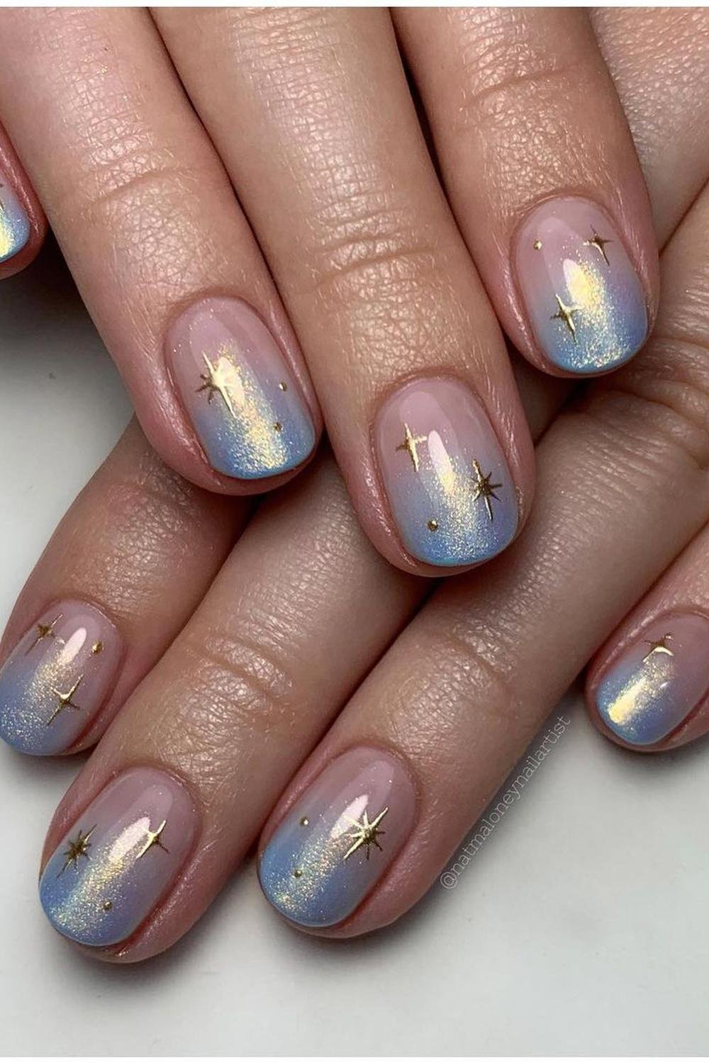 7 - Picture of Chrome Star Nails