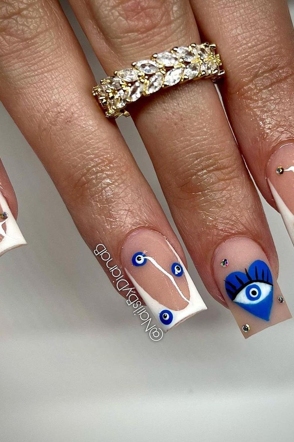 33 - Picture of Evil Eye Nails
