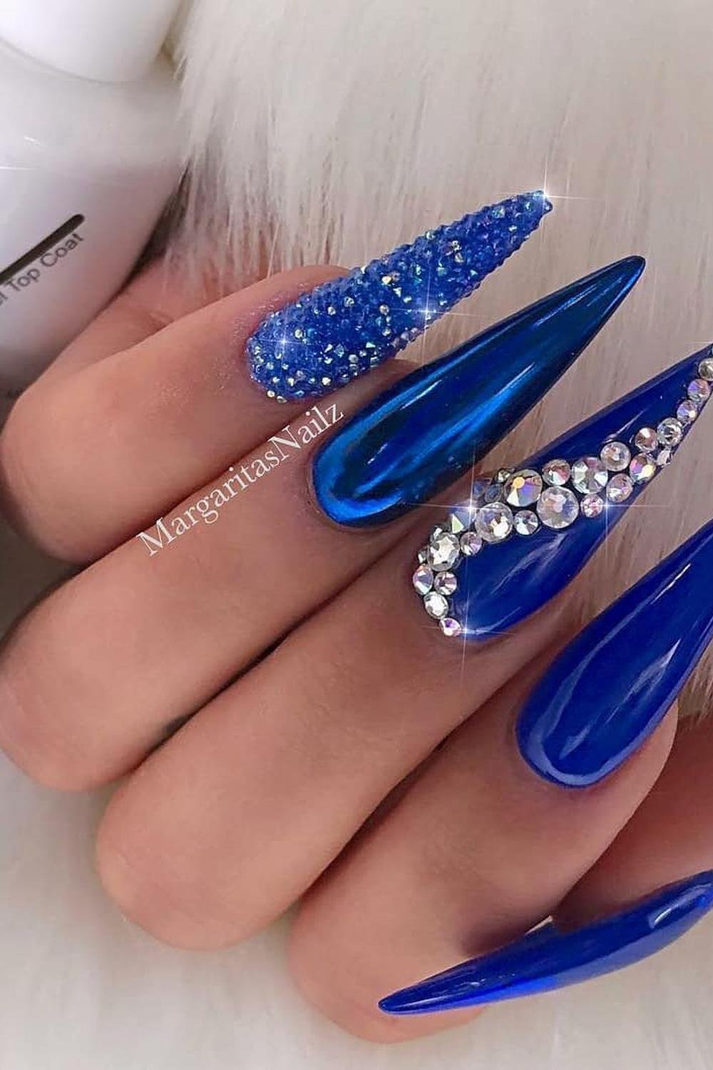 29 - Picture of Blue Chrome Nails