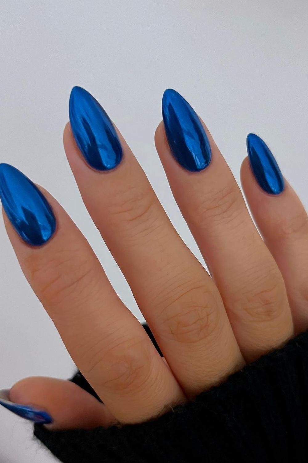 33 - Picture of Blue Chrome Nails