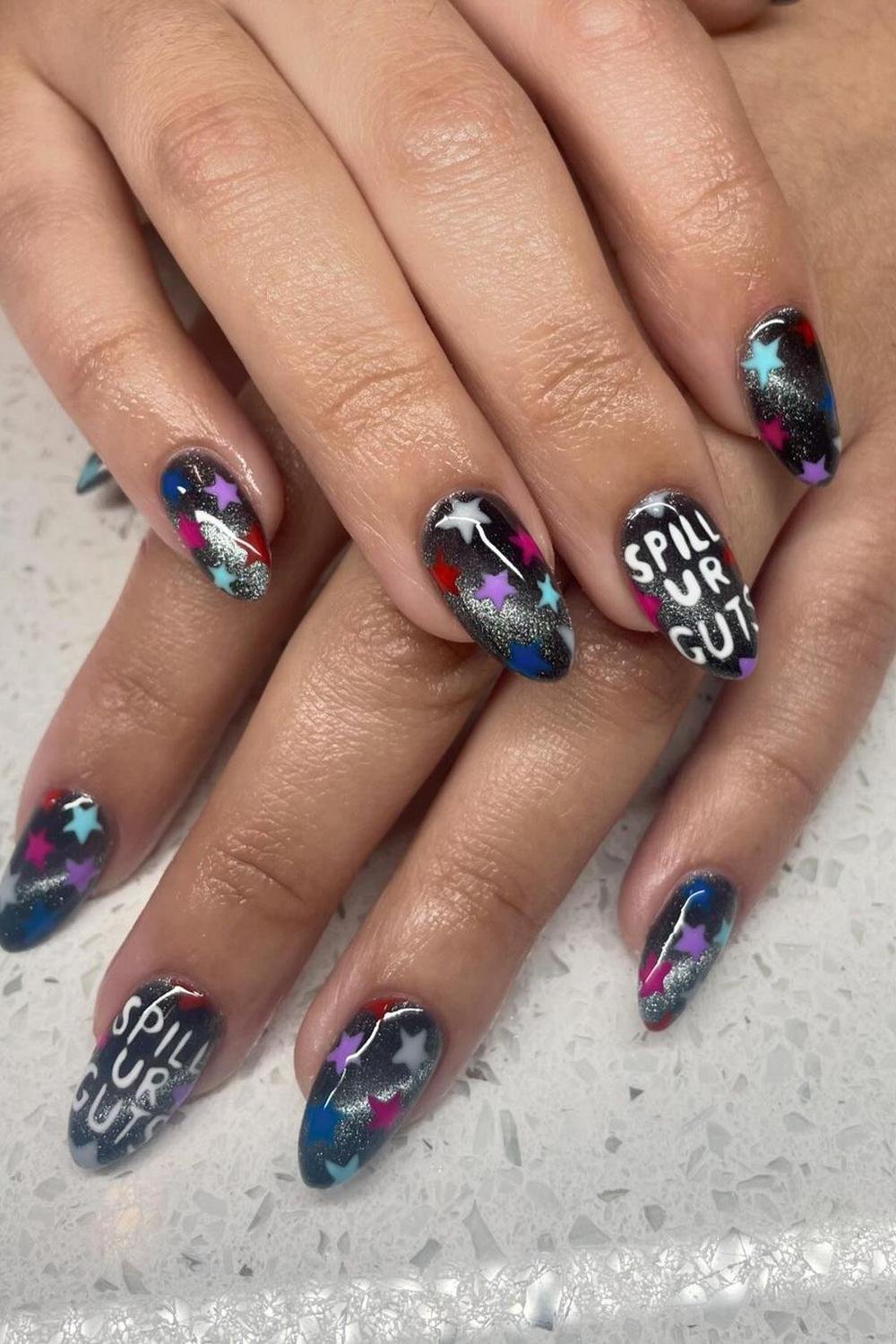 30 - Picture of Guts Tour Nails